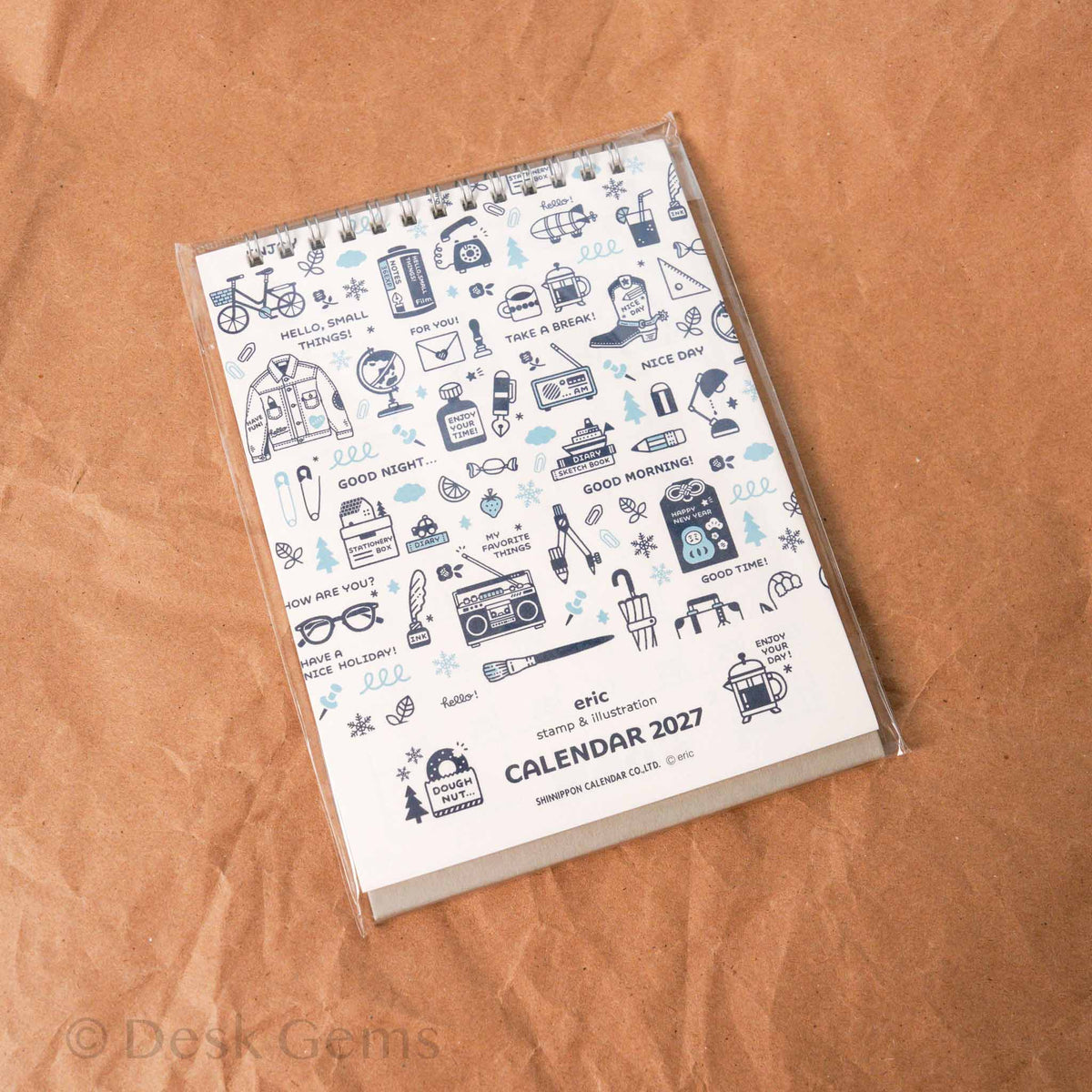 Eric Small Things Desk Calendar 2027 front cover with blue stamp-style illustrations