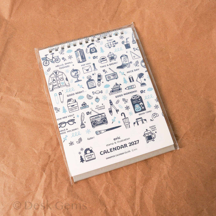 Eric Small Things Desk Calendar 2027 front cover with blue stamp-style illustrations