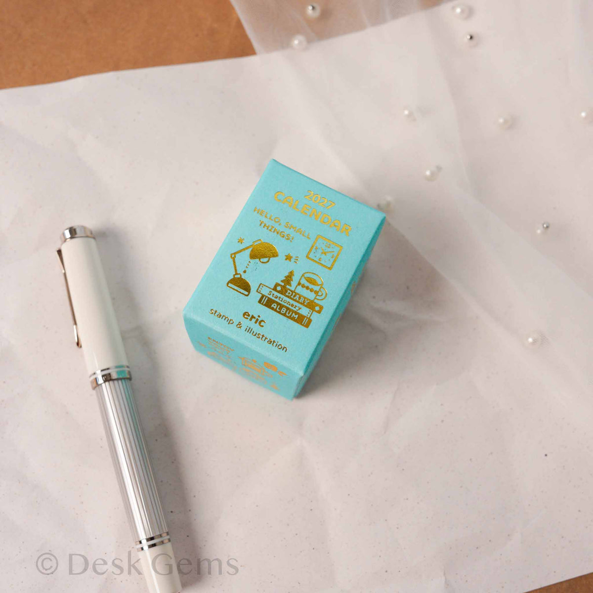 Eric Small Things Mini Mini Daily Calendar 2027 teal box with gold foil lettering