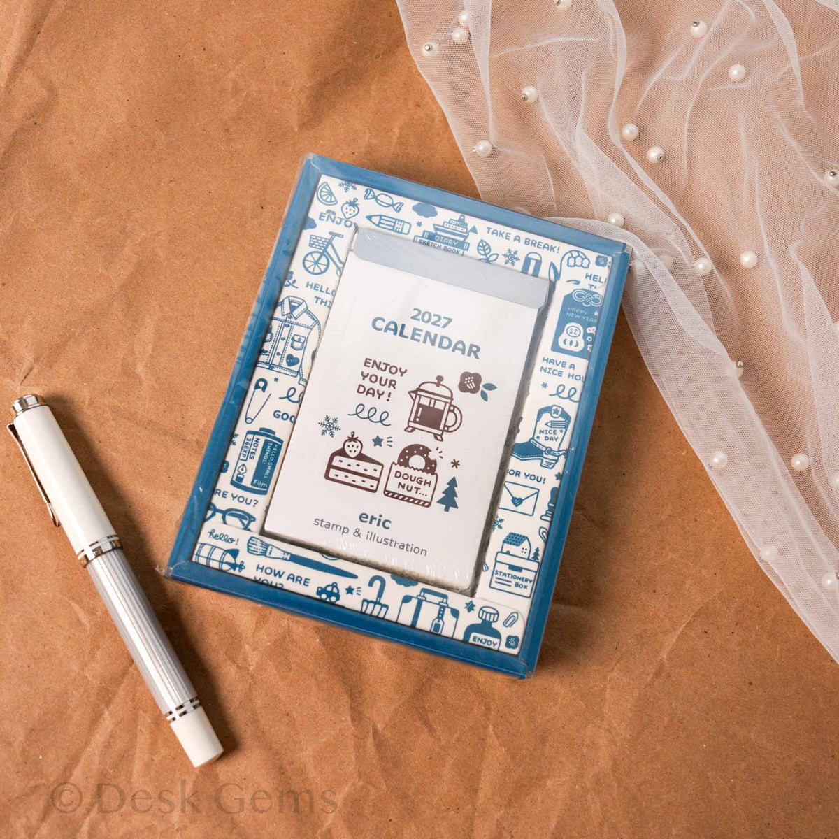 Eric Small Things 2-way Calendar 2027 in blue packaging on brown kraft paper