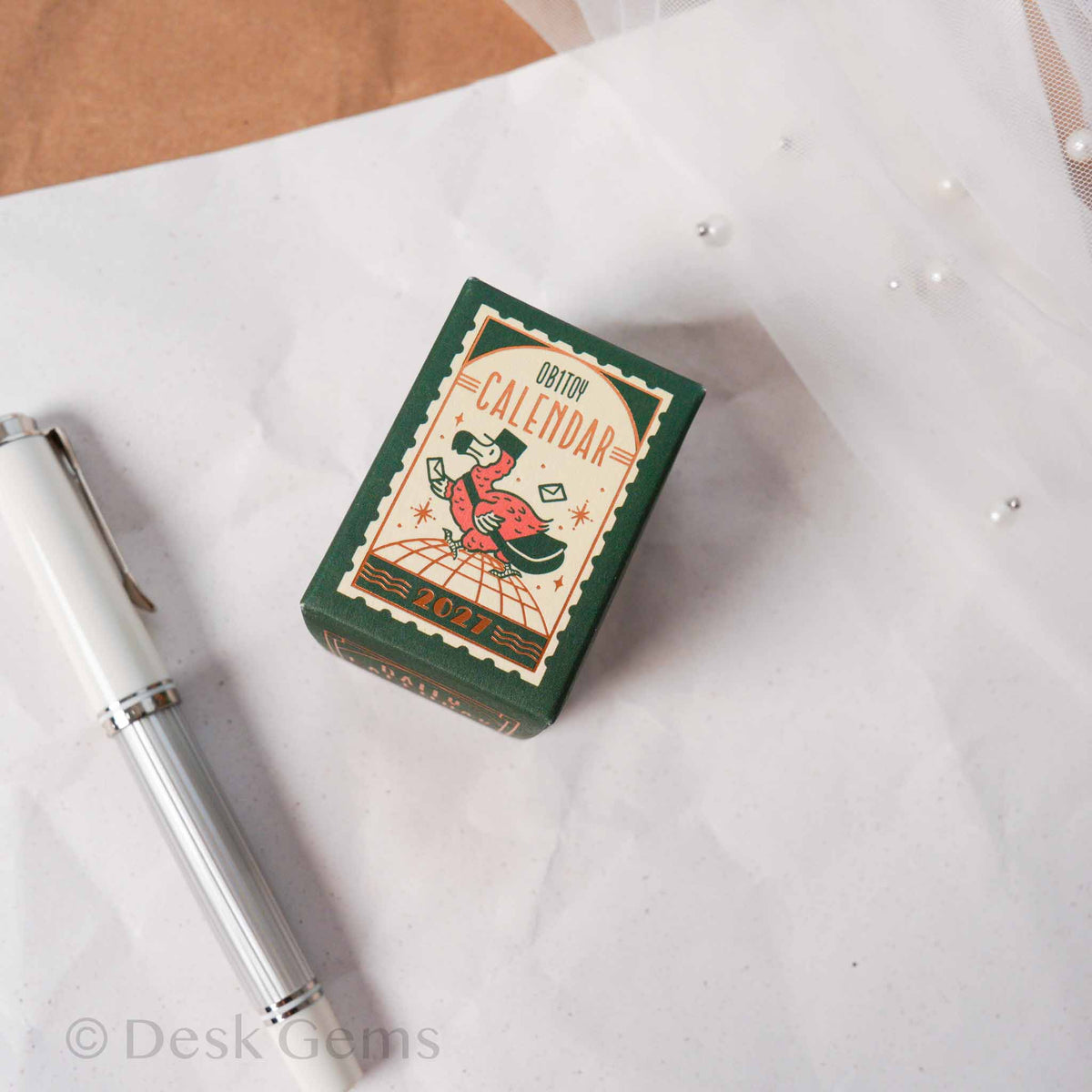 Obi-Wan Retro Mini Mini Daily Calendar 2027 deep green foil-stamped box with pen for scale