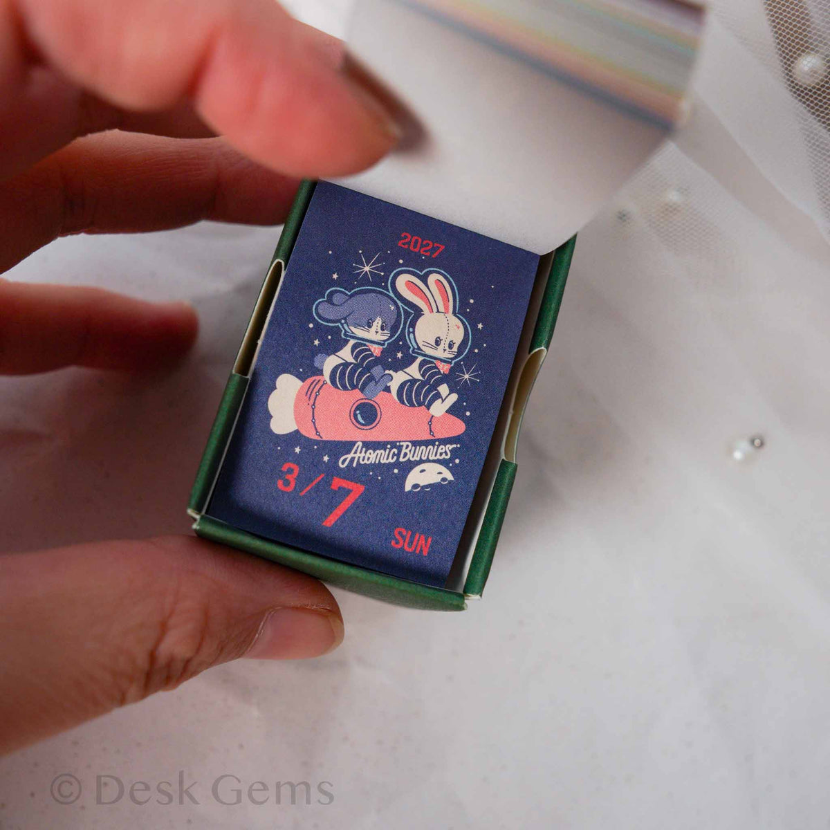 Obi-Wan Retro Mini Mini Daily Calendar 2027 open box showing Atomic Bunnies space illustration page