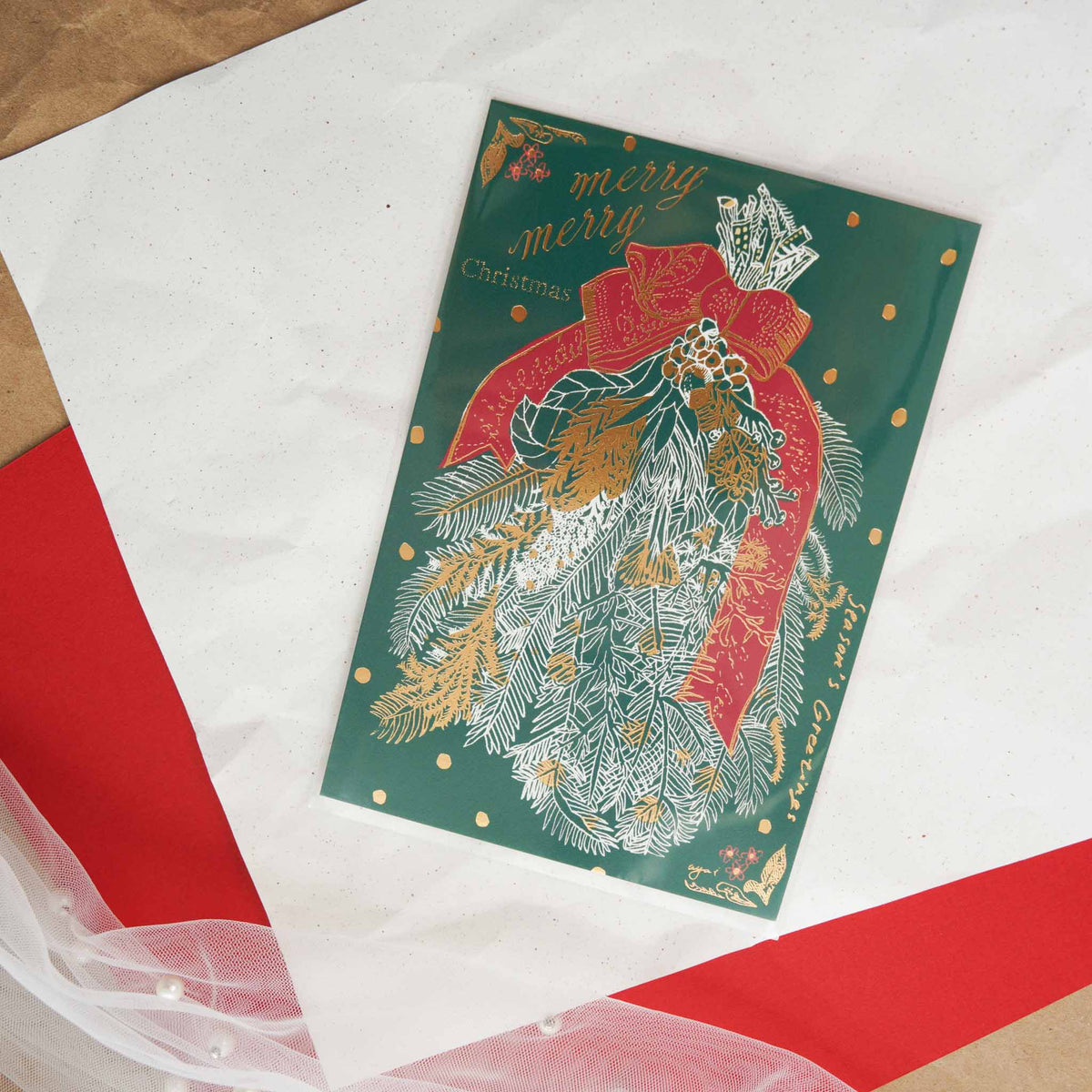 Aya Inoue Christmas postcard with elegant green holiday swag and red ribbon