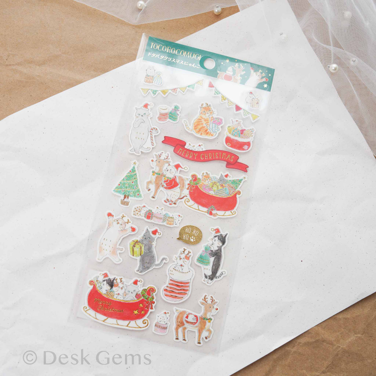 Tocoro Comugi Christmas sticker sheet with cats in a holiday sleigh