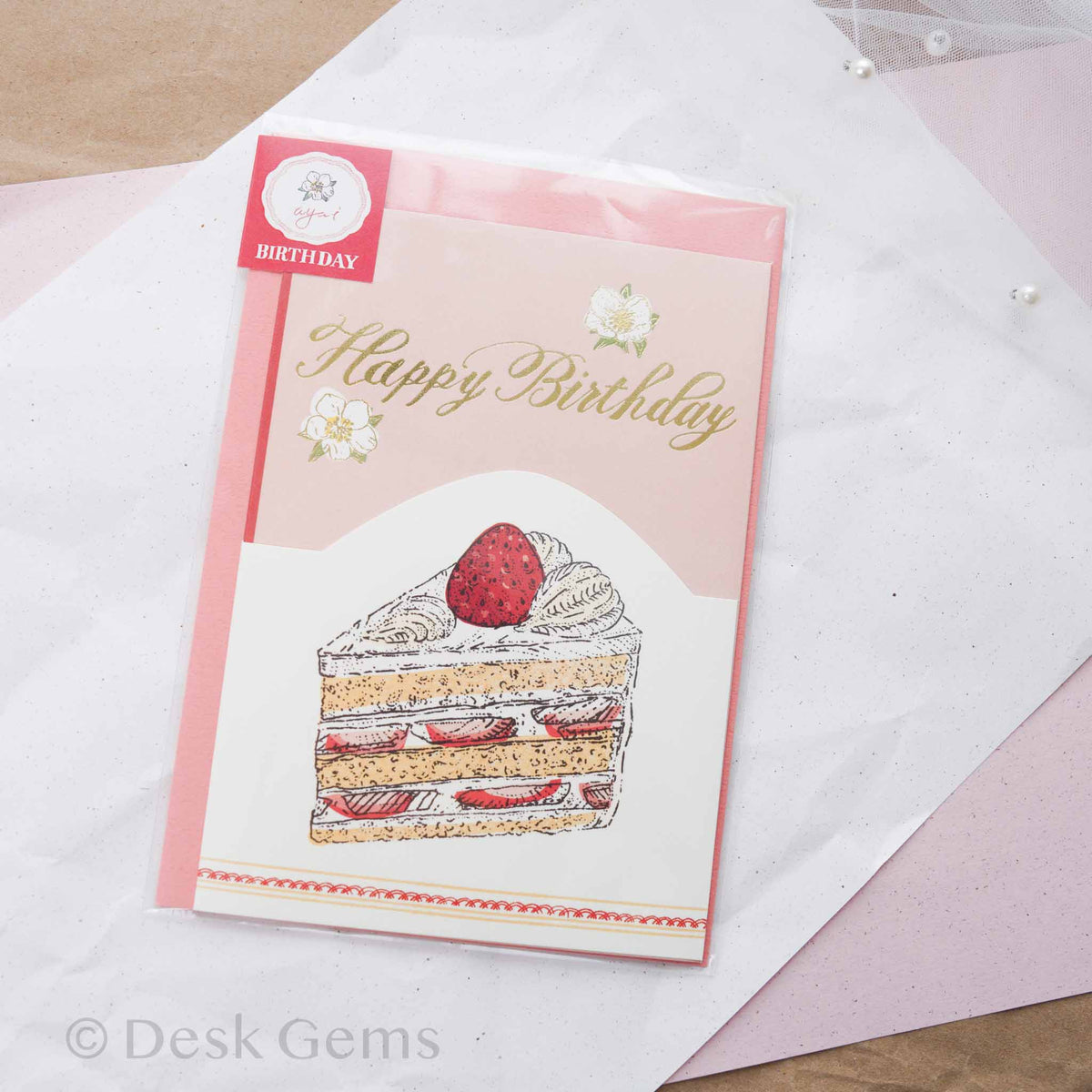 Aya Inoue trifold birthday card with gold foil Happy Birthday lettering and strawberry short cake illustration on pink background