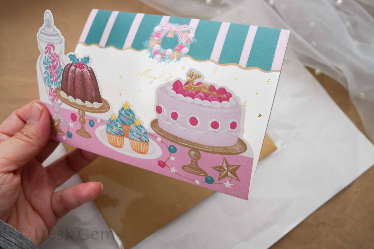 Arakarudo Christmas trifold card standing open showing pop-up patisserie display