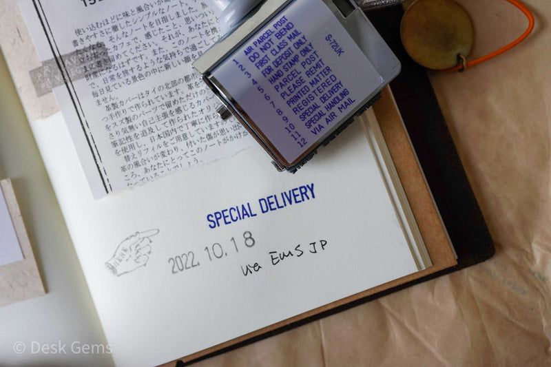 Shiny Postal Rotating Phrase Stamp – Desk Gems